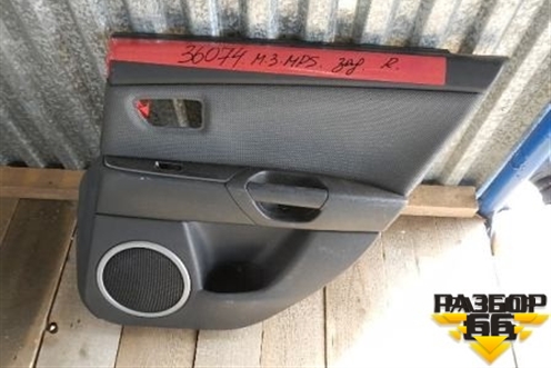 Обшивка двери задней правой под электрику для Mazda Mazda 3 (BK) с 2003-2009г 