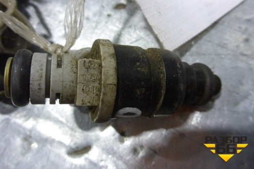 Форсунка инжекторная электрическая (1.3л) (MR988977) для Mitsubishi Colt с 2004г