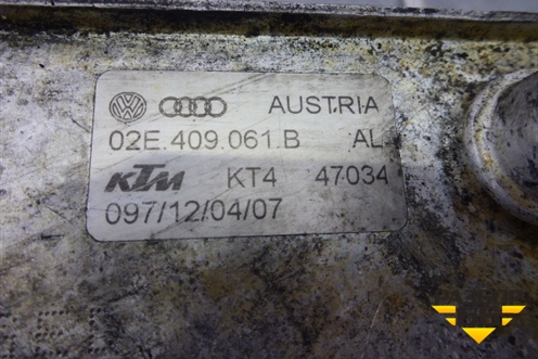 Радиатор маслоохладитель КПП (02E409061B) для Volkswagen Touran с 2003-2010г