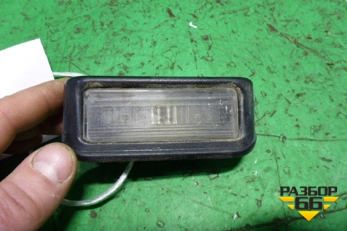 Фонарь подсветки номера (466870002) для Fiat Doblo с 2005-2015г