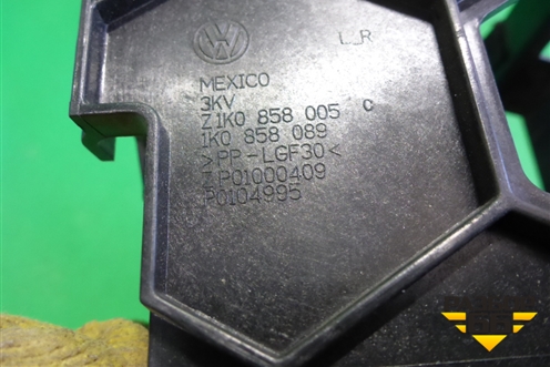 Кронштейн (крепления магнитолы) (1K0858089) для Volkswagen Jetta с 2005-2011г