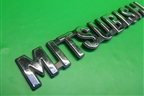 Эмблема да дверь багажника для Mitsubishi Outlander XL с 2006-2012г