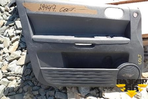 Обшивка двери передней левой под электрику для Mitsubishi Colt с 2004г