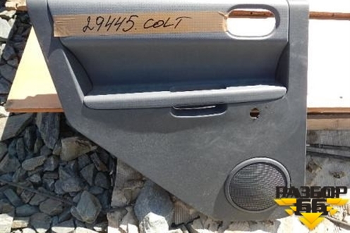 Обшивка двери задней левой под механику для Mitsubishi Colt с 2004г