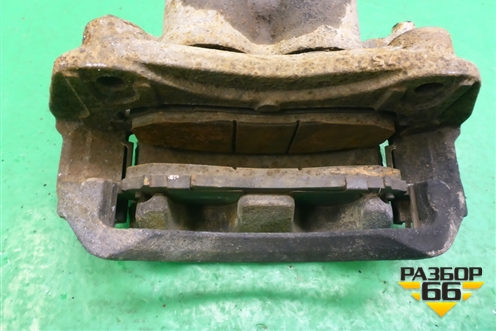 Суппорт передний левый для Nissan Navara (D40) с 2005-2015г (Навара)