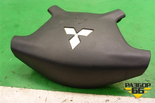 Подушка безопасности в рулевое колесо (7030A099) для Mitsubishi Pajero/Montero с 2007г