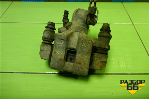 Суппорт задний левый для Kia Spectra с 2001г (Спектра)