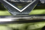 Решетка радиатора (под камеру) (8891868310) для Geely Atlas 2 с 2023-2025г (Атлас)